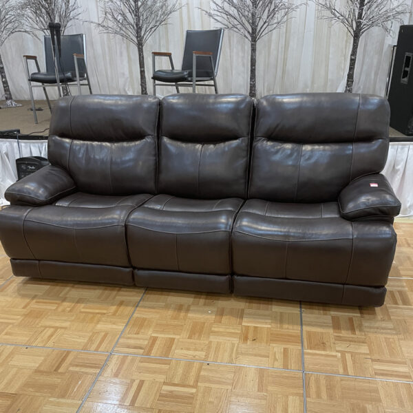 Genuine Leather Reclining Sofa with push button controls.