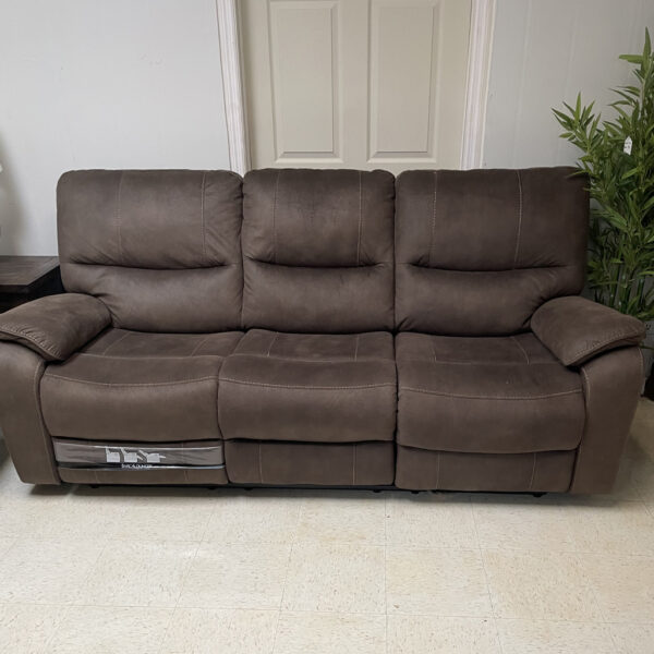 Soft Leather Sofa with manual reclining on each end. 